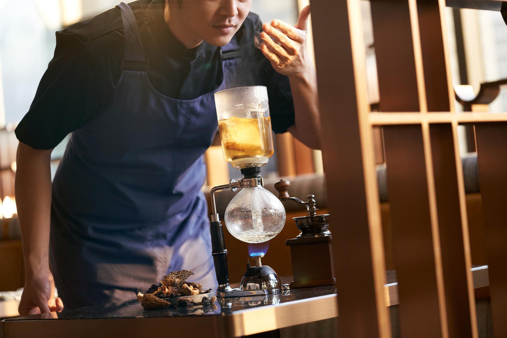 The Clan Hotel Singapore By Far East Hospitality Exterior photo A barista using a siphon coffee maker